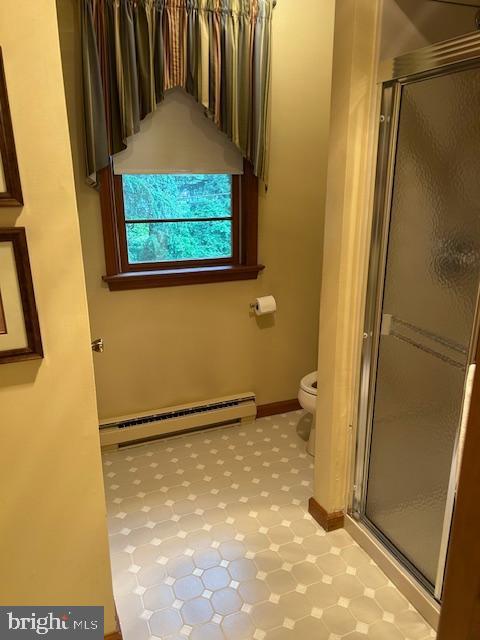 1469 Cathys Ln, North Wales, PA 19454 - bathroom with a baseboard radiator, tile patterned floors, and a shower stall