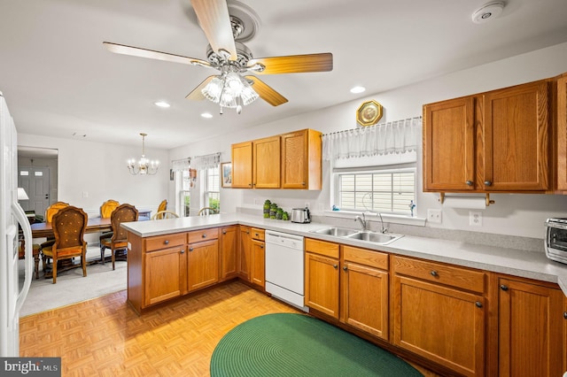 1541 Foresman Dr Unit 125, Pottstown, PA 19464 - kitchen featuring dishwasher, a sink, recessed lighting, plenty of natural light, and a peninsula