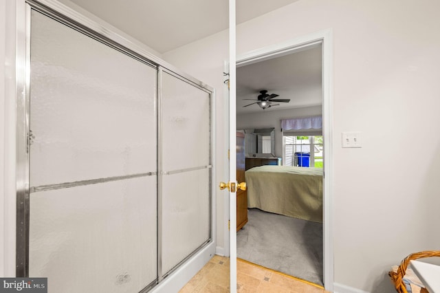 1541 Foresman Dr Unit 125, Pottstown, PA 19464 - ensuite bathroom featuring a stall shower, a ceiling fan, and baseboards