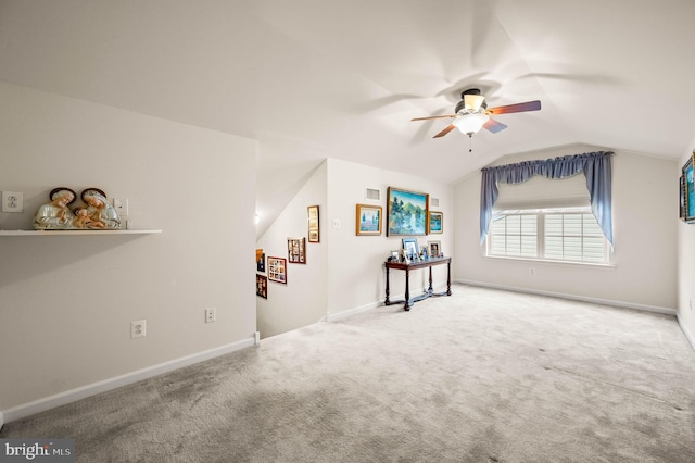 1541 Foresman Dr Unit 125, Pottstown, PA 19464 - empty room featuring a ceiling fan, carpet, vaulted ceiling, and baseboards