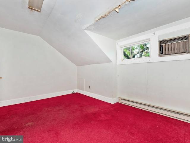 23419 Spire St, Clarksburg, MD 20871 - additional living space featuring a baseboard radiator, lofted ceiling, carpet, baseboards, and an AC wall unit