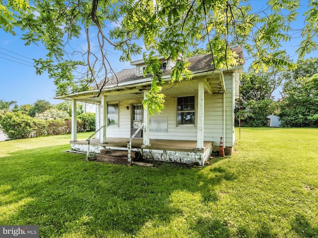 23419 Spire St, Clarksburg, MD 20871 - view of front facade with covered porch and a front yard