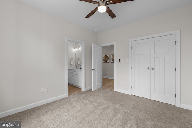 6978 Bray Rd, Hayes, VA 23072 - unfurnished bedroom featuring carpet flooring, a closet, baseboards, ensuite bathroom, and ceiling fan