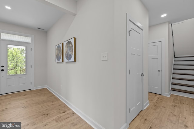 6978 Bray Rd, Hayes, VA 23072 - entrance foyer featuring light wood-style flooring, stairs, baseboards, and recessed lighting