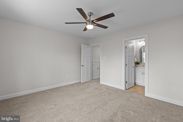 6978 Bray Rd, Hayes, VA 23072 - unfurnished bedroom featuring light colored carpet, baseboards, and ensuite bath
