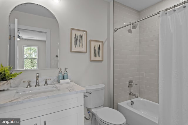 6978 Bray Rd, Hayes, VA 23072 - bathroom with vanity, toilet, shower / bath combo with shower curtain, and ceiling fan
