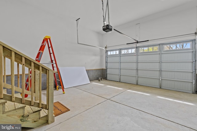 6978 Bray Rd, Hayes, VA 23072 - garage featuring a garage door opener