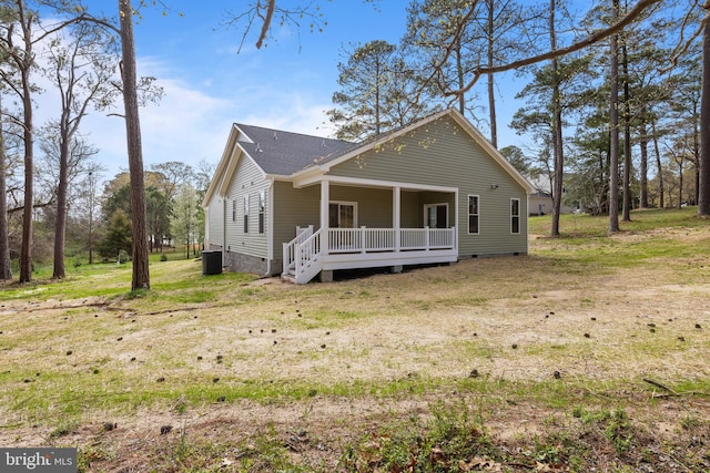 6978 Bray Rd, Hayes, VA 23072 - view of front of house featuring crawl space, central AC unit, and a front lawn