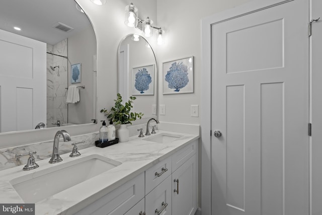 6978 Bray Rd, Hayes, VA 23072 - full bath with double vanity, a shower, and recessed lighting