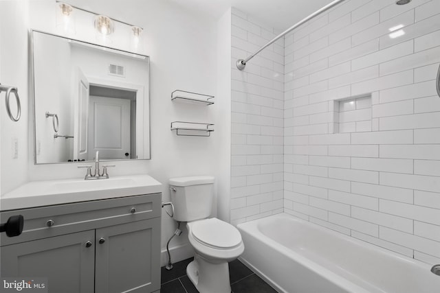 1615 5th St NW, Washington, DC 20001 - full bath featuring toilet, vanity, tile patterned floors, shower / bathtub combination, and baseboards