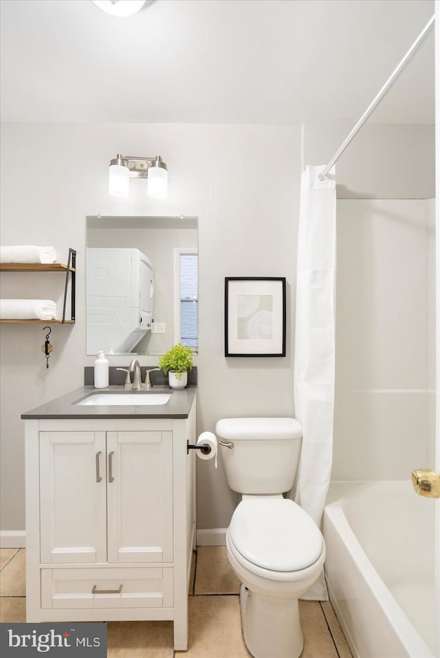 57 E Heath St, Baltimore, MD 21230 - bathroom featuring baseboards, toilet, vanity, and tile patterned floors