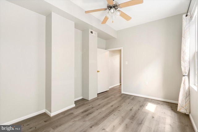 57 E Heath St, Baltimore, MD 21230 - unfurnished bedroom featuring light wood-style floors, baseboards, and ceiling fan