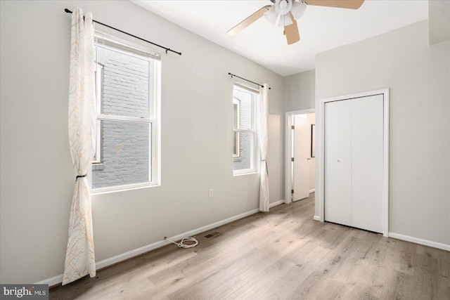 57 E Heath St, Baltimore, MD 21230 - unfurnished bedroom with wood finished floors, baseboards, and a ceiling fan