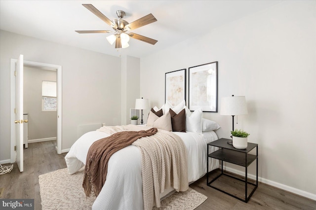 57 E Heath St, Baltimore, MD 21230 - bedroom featuring wood finished floors, baseboards, and a ceiling fan