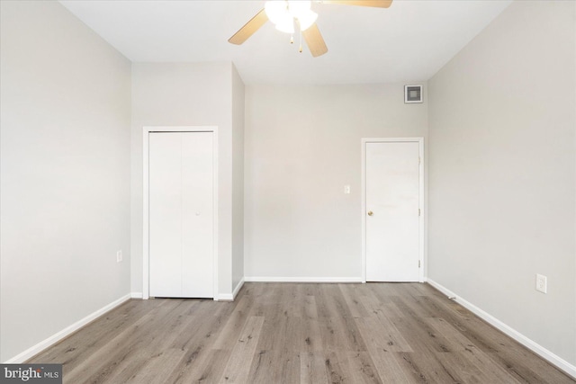 57 E Heath St, Baltimore, MD 21230 - unfurnished bedroom featuring wood finished floors, baseboards, a closet, and ceiling fan