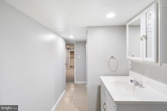 57 E Heath St, Baltimore, MD 21230 - bathroom with vanity, tile patterned floors, baseboards, and recessed lighting