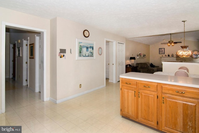 55 Glen Burnie Dr, Sicklerville, NJ 08081 - kitchen with light countertops, ceiling fan, open floor plan, baseboards, and vaulted ceiling