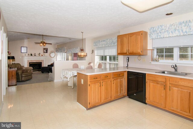 55 Glen Burnie Dr, Sicklerville, NJ 08081 - kitchen featuring dishwasher, a sink, a peninsula, a textured ceiling, and light countertops