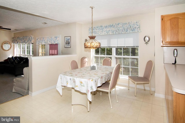 55 Glen Burnie Dr, Sicklerville, NJ 08081 - dining space with baseboards, a textured ceiling, and a chandelier