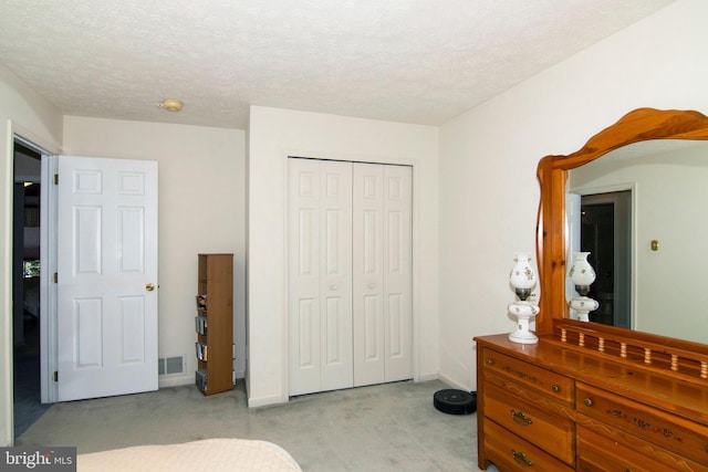 55 Glen Burnie Dr, Sicklerville, NJ 08081 - bedroom featuring light carpet, a closet, baseboards, and a textured ceiling