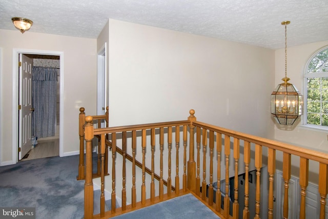 55 Glen Burnie Dr, Sicklerville, NJ 08081 - stairs featuring a chandelier, carpet, a textured ceiling, and baseboards