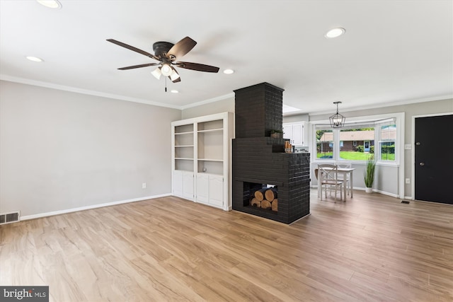 5214 Juliet St, Springfield, VA 22151 - unfurnished living room with a ceiling fan, crown molding, recessed lighting, light wood-type flooring, and a brick fireplace