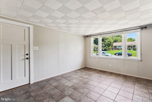 5214 Juliet St, Springfield, VA 22151 - unfurnished room with baseboards and wood walls