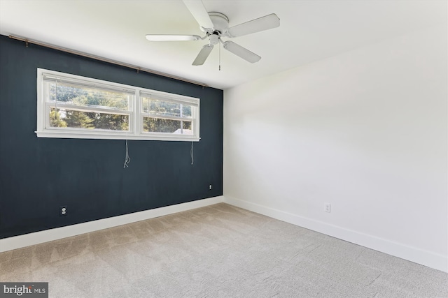 5214 Juliet St, Springfield, VA 22151 - carpeted spare room featuring baseboards and a ceiling fan