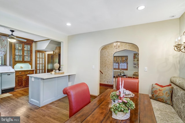 2305 S Inge St S, Arlington, VA 22202 - dining area with arched walkways, wood finished floors, baseboards, recessed lighting, and a ceiling fan