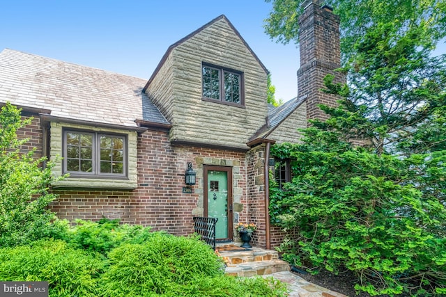 2305 S Inge St S, Arlington, VA 22202 - english style home featuring a chimney and a high end roof