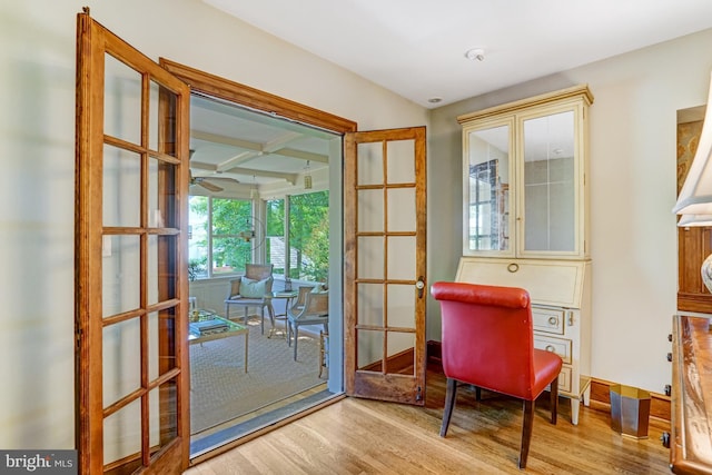 2305 S Inge St S, Arlington, VA 22202 - living area with wood finished floors, coffered ceiling, french doors, beamed ceiling, and baseboards