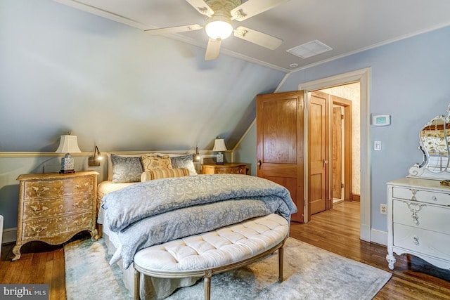 2305 S Inge St S, Arlington, VA 22202 - bedroom with vaulted ceiling, wood finished floors, baseboards, a ceiling fan, and ornamental molding
