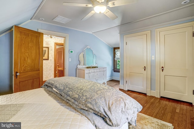 2305 S Inge St S, Arlington, VA 22202 - bedroom with lofted ceiling, wood finished floors, a ceiling fan, and baseboards