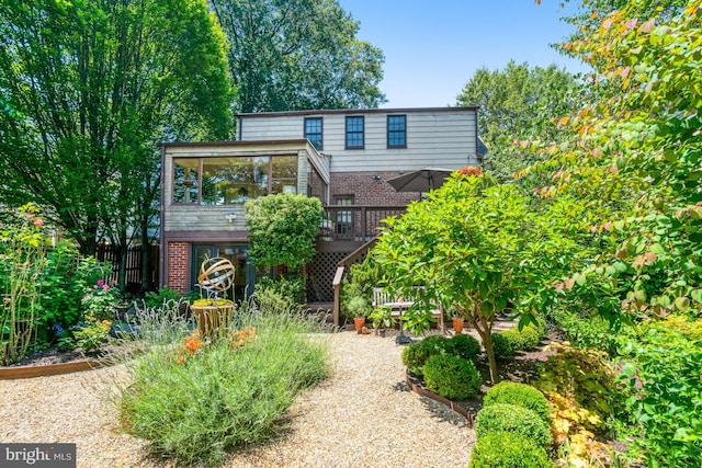 2305 S Inge St S, Arlington, VA 22202 - view of front of property with brick siding, a deck, and stairway