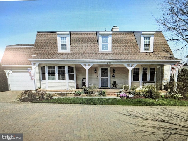 823 Dunbrooke Ct, Frederick, MD 21701 - view of front facade with a porch, an attached garage, driveway, and a shingled roof