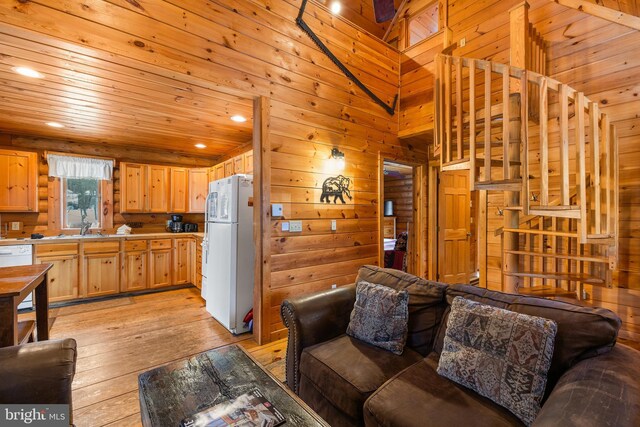 45 Village Dr Unit 4, Oakland, MD 21550 - living area with light wood finished floors, wooden walls, wood ceiling, and recessed lighting