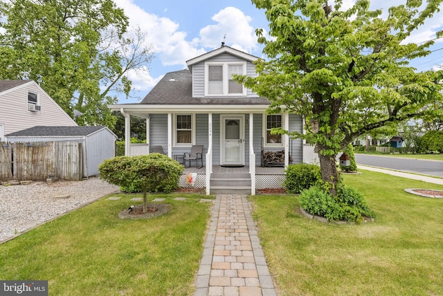2034 Beach Blvd, Point Pleasant Boro, NJ 08742 - bungalow featuring covered porch and roof with shingles