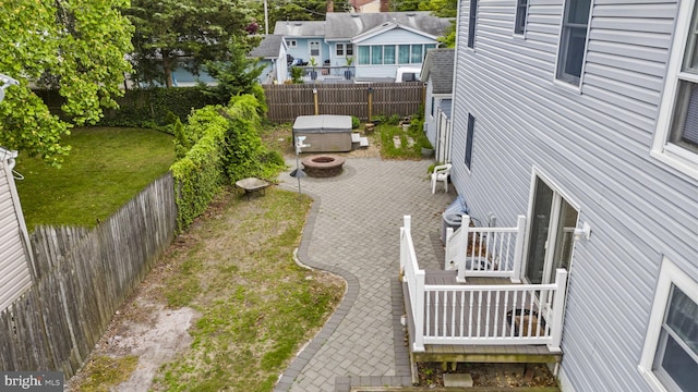 2034 Beach Blvd, Point Pleasant Boro, NJ 08742 - fenced backyard featuring an outdoor fire pit and a patio