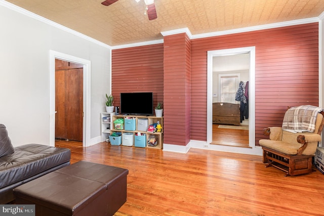1751 Temple Ave, Lancaster, PA 17603 - living area featuring an ornate ceiling, ceiling fan, wood finished floors, and crown molding