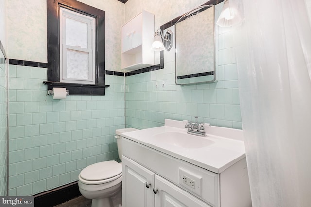 1751 Temple Ave, Lancaster, PA 17603 - bathroom featuring tile walls, toilet, and vanity