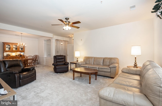 1402 Joppa Forest Dr Unit 7, Joppa, MD 21085 - carpeted living room with ceiling fan, a chandelier, and ornate columns