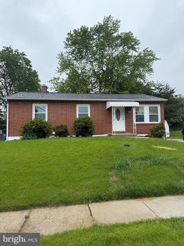 461 Doris Cir, Aberdeen, MD 21001 - single story home with brick siding, a front yard, and a chimney