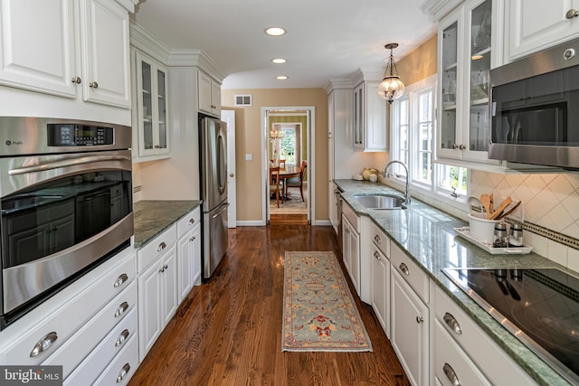 4582 Province Line, Princeton, NJ 08540 - kitchen with appliances with stainless steel finishes, a sink, white cabinets, dark wood finished floors, and recessed lighting