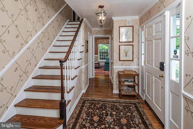 4582 Province Line, Princeton, NJ 08540 - foyer featuring wood finished floors, crown molding, stairway, wallpapered walls, and a chandelier
