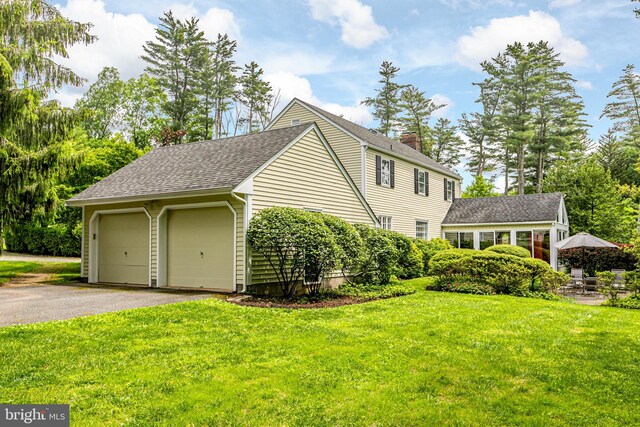 4582 Province Line, Princeton, NJ 08540 - view of side of property with a chimney, roof with shingles, a garage, and a yard