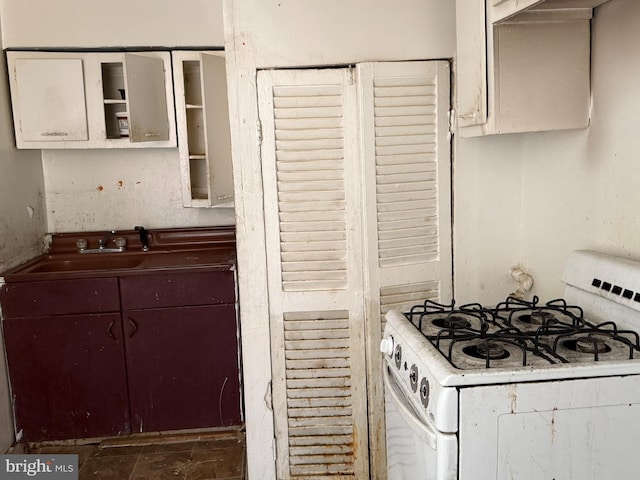 1310 Edmondson Ave, Baltimore, MD 21223 - kitchen featuring gas range gas stove