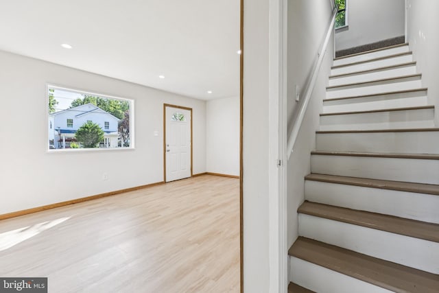 135 Polk Dr, Manassas Park, VA 20111 - staircase featuring wood finished floors, recessed lighting, and baseboards