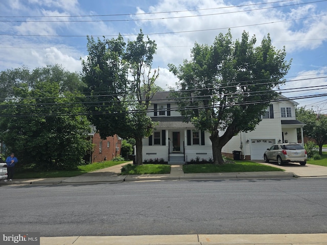 31 W Whitlock Ave, Winchester, VA 22601 - view of front of house with a garage and concrete driveway