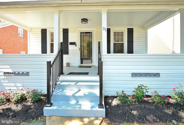 31 W Whitlock Ave, Winchester, VA 22601 - property entrance with a porch