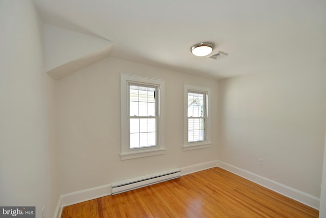 31 W Whitlock Ave, Winchester, VA 22601 - bonus room featuring a baseboard radiator, light wood-style floors, and baseboards